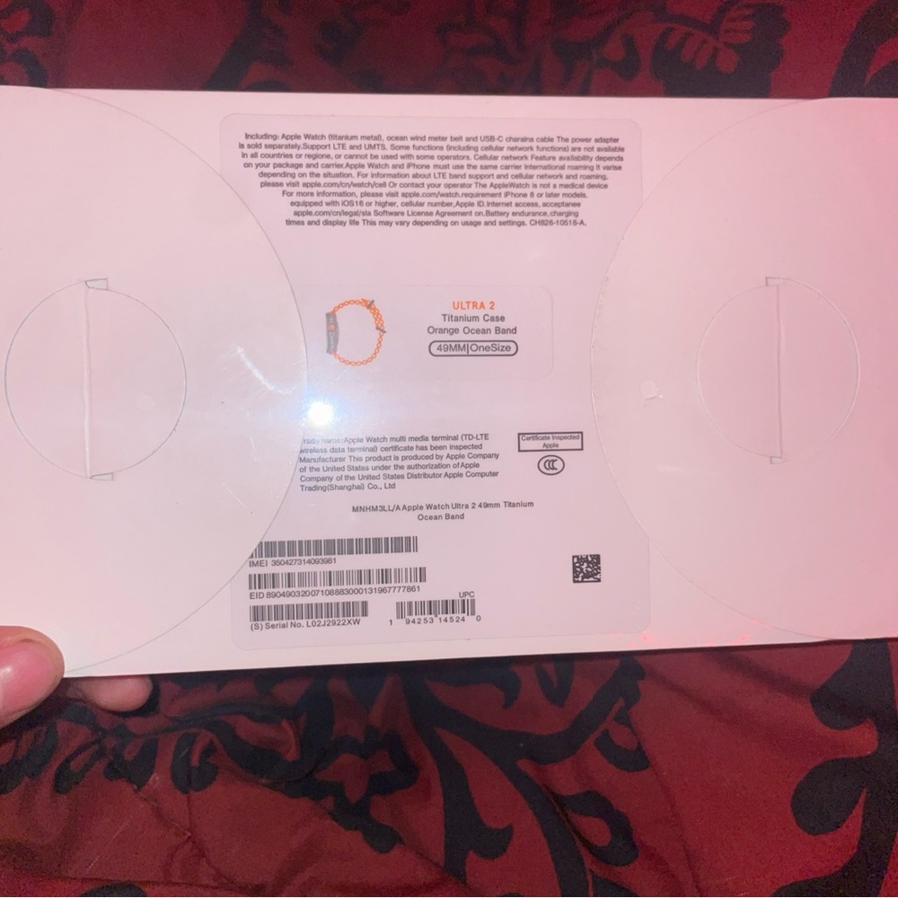 Apple Watch Ultra 2 Titanium Case with Orange Ocean Band